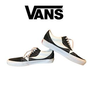 Vans Black and White classic lace up shoes.  Ladies size 9 1/2.